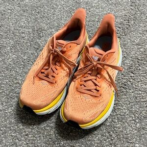 Hoka Orange and Yellow Running Shoes
